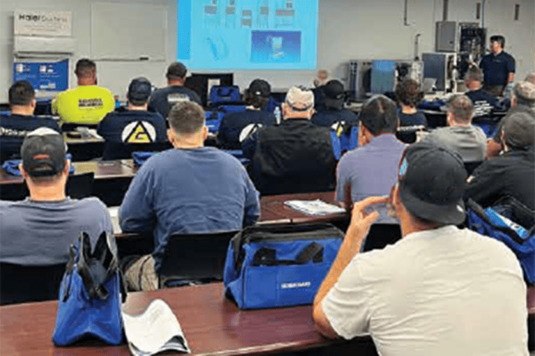 Technicians and service personnel attending a classroom-style training session on Hoshizaki commercial equipment